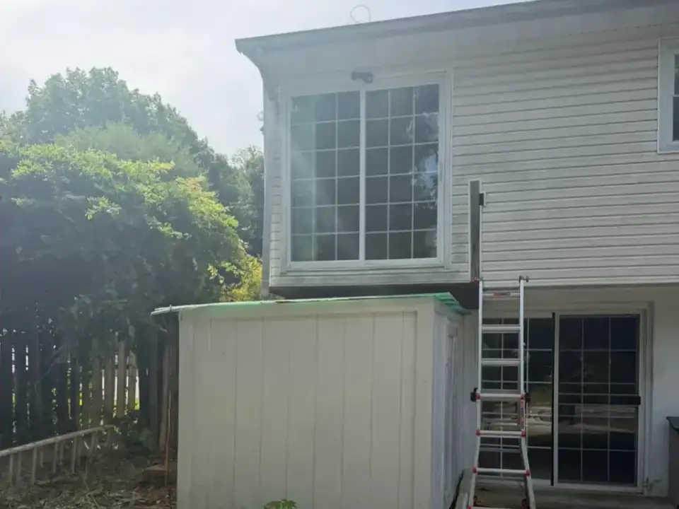 After: the deck and stairs removed from the back of the house